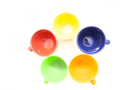 Colorful cup on isolated white backgroundの写真素材