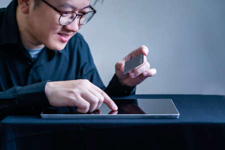 Business owner using credit card buying or purchase online products digital tablet, Internet banking or online smart technology conceptの写真素材