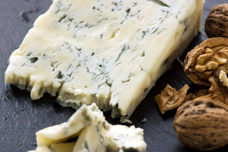 Gorgonzola cheese on black backgroundの写真素材