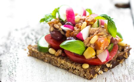 Delicious sandwich with tuna and fresh crunchy vegetablesの写真素材