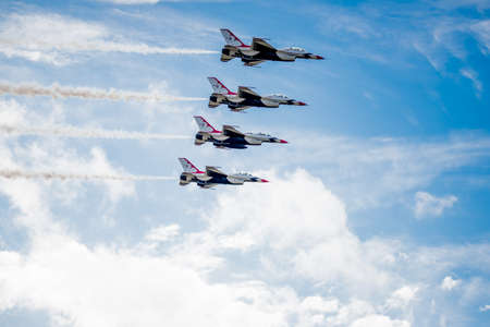 San Antonio, Texas - October, 31: United States Air Force F-16 Thunderbirds in formation above the...