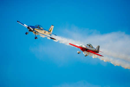 SAN ANTONIO, USA - October 31, 2015: Two Stunt Planes flying in Tight Formation