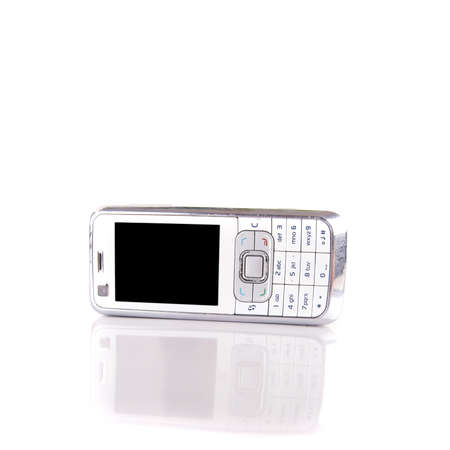 Isolated shot of a white cell phone. The phone is mirrored and isolated over pure white. Lot of...