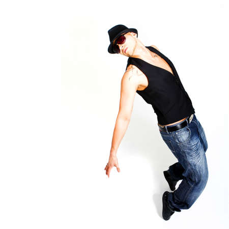 Asian young stylish dancer over white background.の写真素材