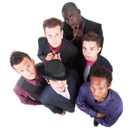 Young group of businessmen isolated over white background. Trendy multiracial group.の写真素材