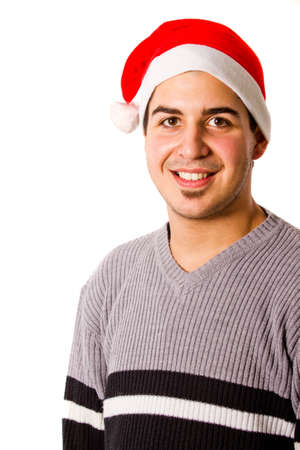 Young man with chirstmas hat isolated over whiteの写真素材