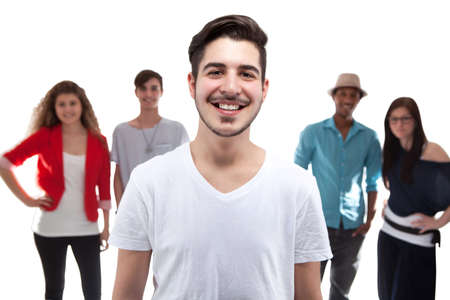 Handsome Man Standing In Front Of His Friends On White Backgroundの写真素材