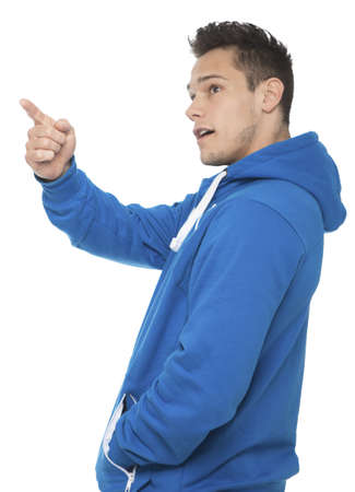 Portrait Of Young Man Pointing On White Backgroundの写真素材