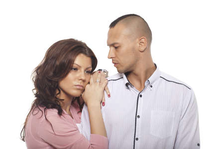 Portrait Of Sad Couple On White Backgroundの写真素材