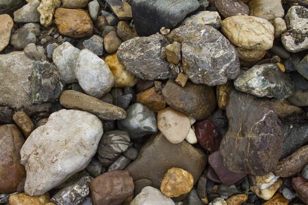 texture of small stones of different colors and shapes