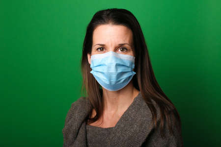 Beautiful woman wearing a mouth mask