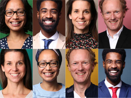 Beautiful happy people in front of a backgroundの写真素材