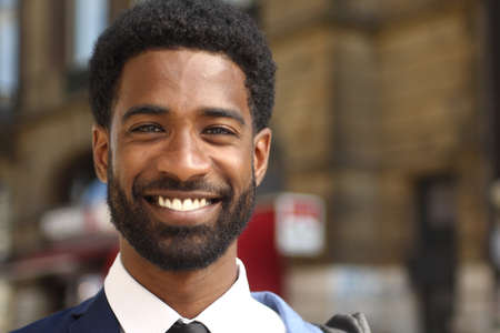 Portrait of a beautiful business man outside
