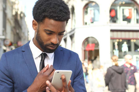 Portrait of a beautiful business man outside