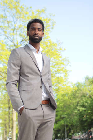 Beautiful businessman outside in the summerの写真素材