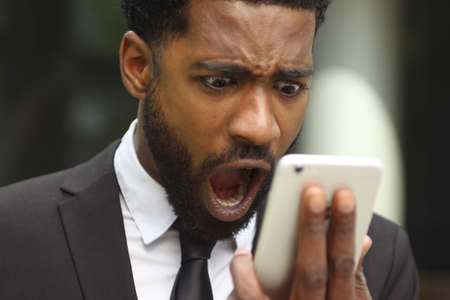 Beautiful businessman outside in the summerの写真素材