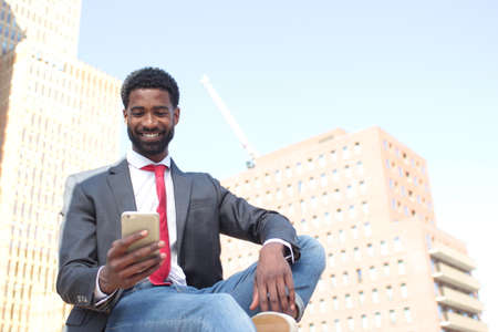 Beautiful businessman outside in the summerの写真素材