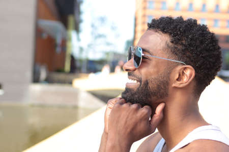 Beautiful businessman outside in the summer