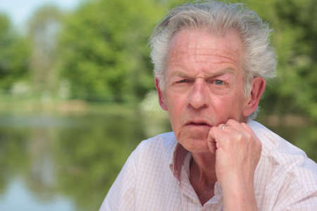 Beautiful old man outsideの写真素材