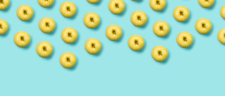 top view of apples isolated on turquoise backgroundの写真素材