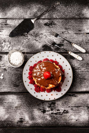 Top view of pancakes on black tableの写真素材