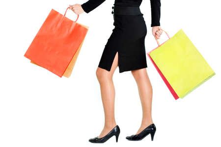 Woman with shopping bags, isolated on whiteの写真素材