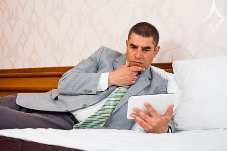Businessman using digital tabletの写真素材