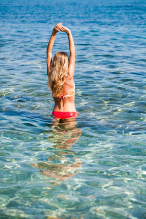 Woman standing in seaの写真素材