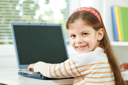 Child using laptopの写真素材