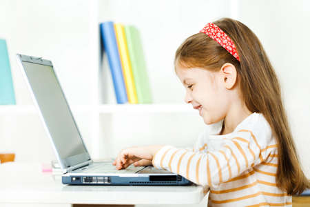 Child using laptopの写真素材