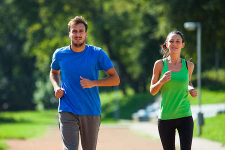 Young couple joggingの写真素材