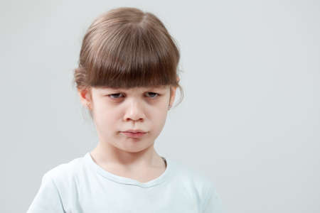 Portrait of displeased childの写真素材
