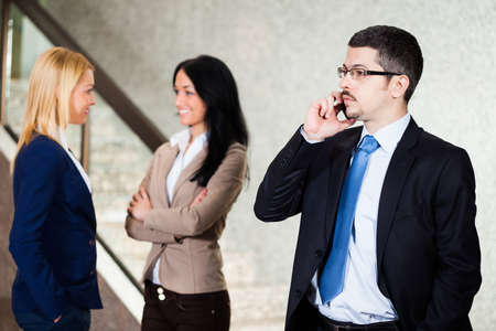 Business people in lobbyの写真素材