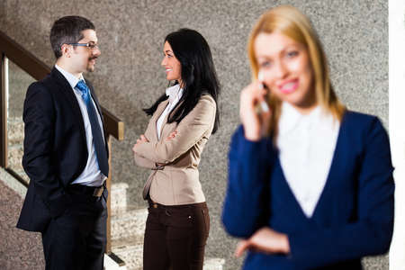 Business people in lobbyの写真素材