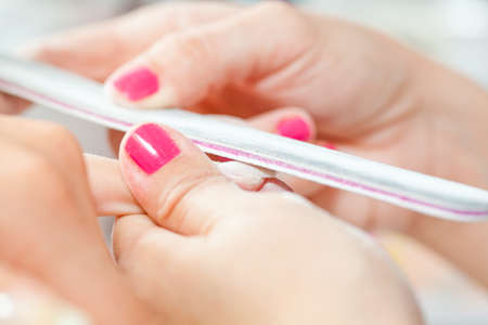 Nail treatment in beauty salonの写真素材