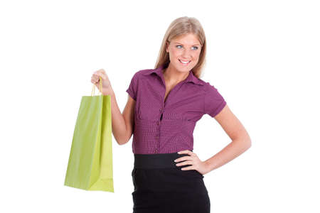 Woman with shopping bag isolated on whiteの写真素材