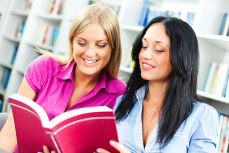 Students learning in libraryの写真素材