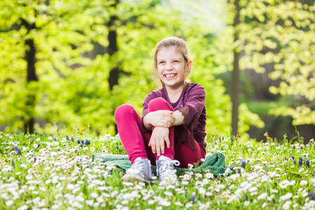 Happy child in parkの写真素材