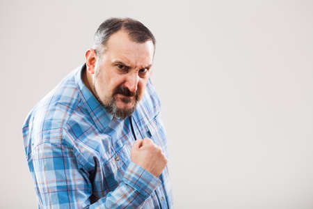 Portrait of angry man who threatensの写真素材