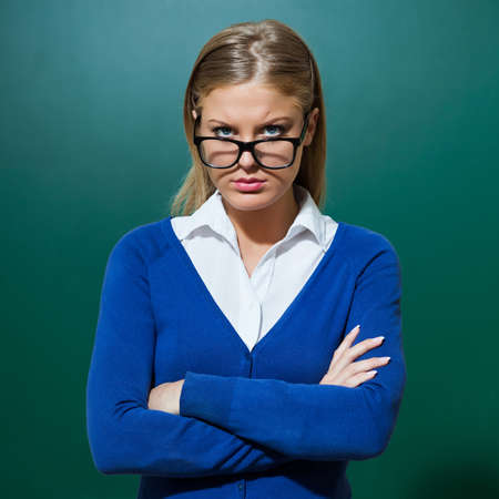 Portrait of young angry teacherの写真素材