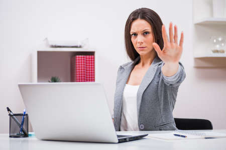 Young businesswoman wants to work alone.の写真素材