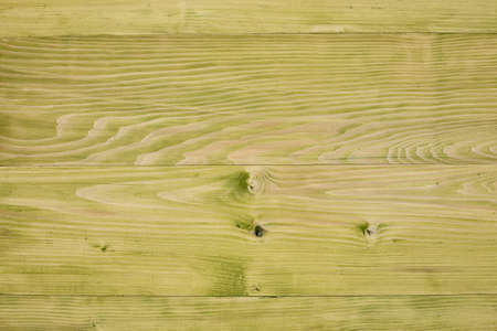 Rustic textured wooden background with knots. Empty template.の写真素材