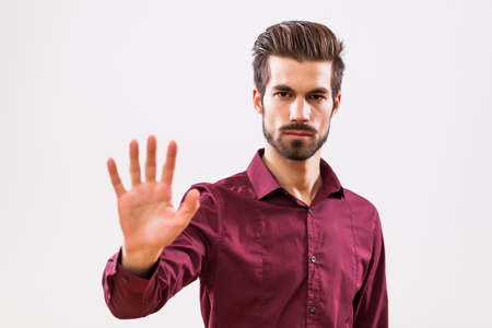 Studio shot portrait of young authoritative businessman.の写真素材