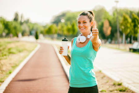 Young woman is ready for outdoor workout.