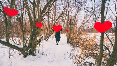 Lonely woman is searching for love. Conceptual image.の写真素材