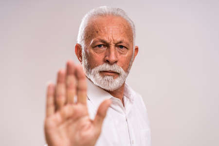 Portrait of serious and authoritative senior man.の写真素材