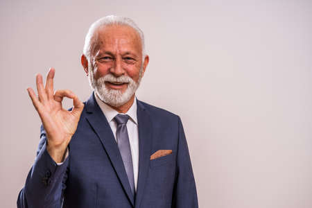 Portrait of happy and successful senior businessman.の写真素材