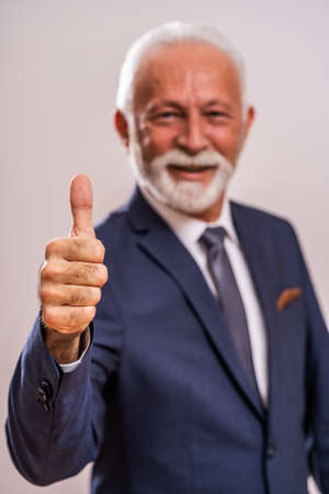 Portrait of happy and successful senior businessman.の写真素材
