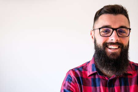 Portrait of happy man who is smiling. Copy space on image for your text or advert.の写真素材