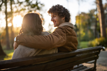 Happy loving couple enjoying their time together in park.の写真素材